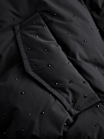 Next - Abrigo en negro