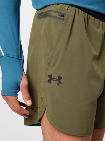 Regular Pantalon de sport 'Peak' UNDER ARMOUR en vert
