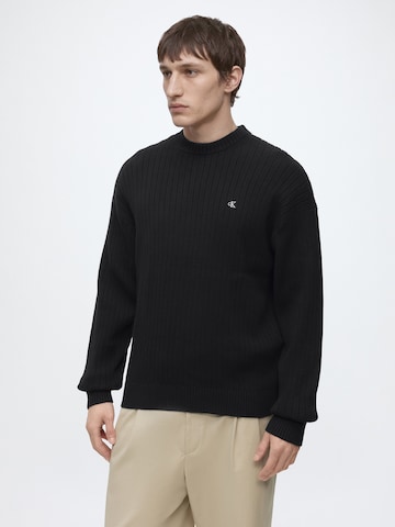 Pulover de la Calvin Klein Jeans pe negru: față