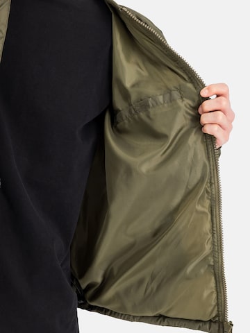 ALPHA INDUSTRIES Winter Jacket 'MA-1' in Green