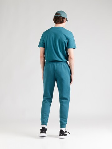 PUMA Regular Sportbroek 'ESS No. 1' in Groen