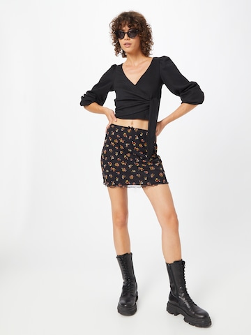 Monki - Blusa en negro