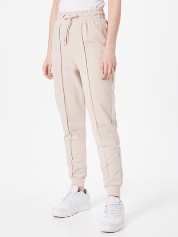 River Island Tapered Παντελόνι σε μπεζ: μπροστά