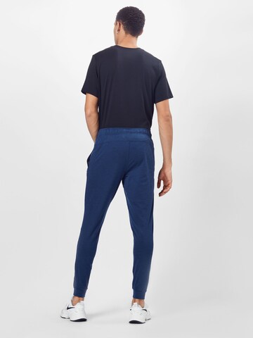 NIKE Конический (Tapered) Спортивные штаны в Синий