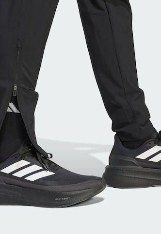 regular Pantaloni sportivi 'Tiro' di ADIDAS PERFORMANCE in nero