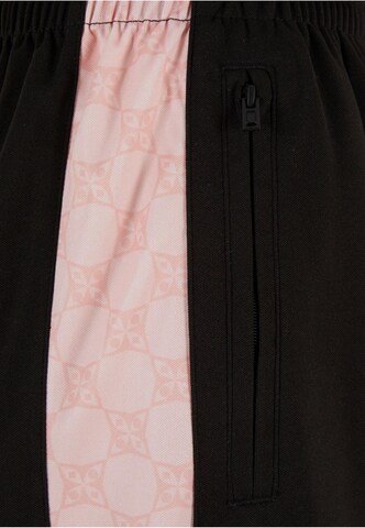 regular Pantaloni di Pequs in nero