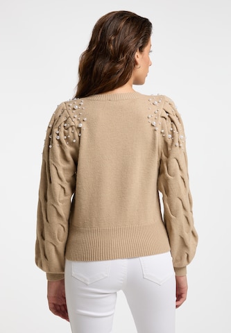 Pullover di faina in beige