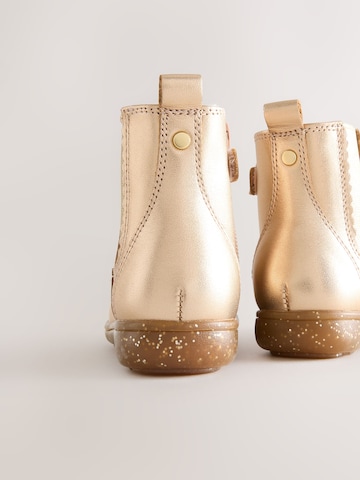 Next Stiefel in Gold