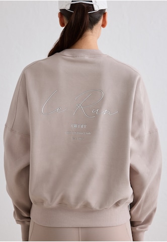Sweat de sport 'Le Run' Aim'n en marron