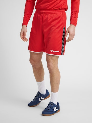 Hummel Regular Urheiluhousut 'Poly' värissä punainen: edessä