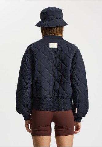 Veste mi-saison 'Lyon' rethinkit studios en bleu