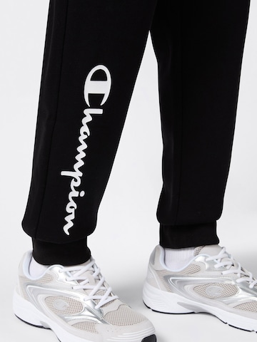 Champion Authentic Athletic Apparel Zwężany krój Spodnie w kolorze czarny
