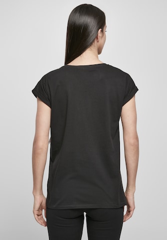 Merchcode T-Shirt 'L´oiseau De Paradis' in Schwarz