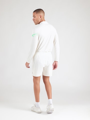 ASICS Regular Sports trousers in White