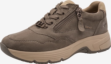 Baskets basses Tamaris en beige : devant