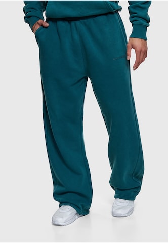 Dropsize Loose fit Trousers in Green: front