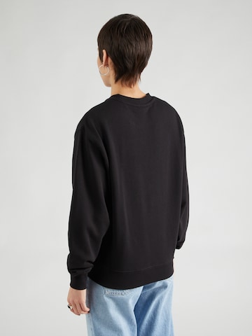 TOMMY HILFIGER Sweatshirt in Schwarz