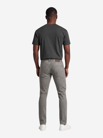 Slimfit Jeans 'XM000070 AF27185' di ARMANI EXCHANGE in beige
