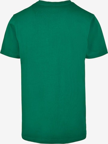T-Shirt 'Never On Time' Merchcode en vert