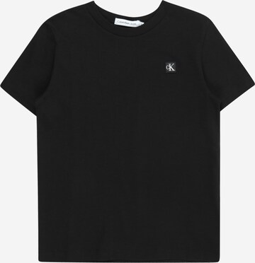 Calvin Klein Jeans T-shirt i svart: framsida