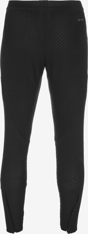 NIKE Skinny Sporthose in Schwarz