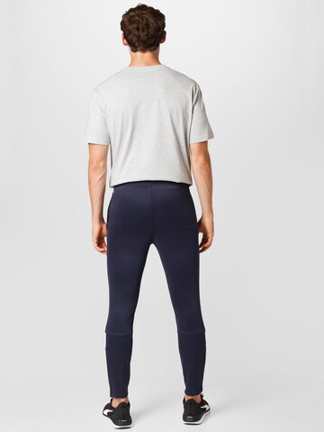 PUMA Tapered Sportbroek in Blauw