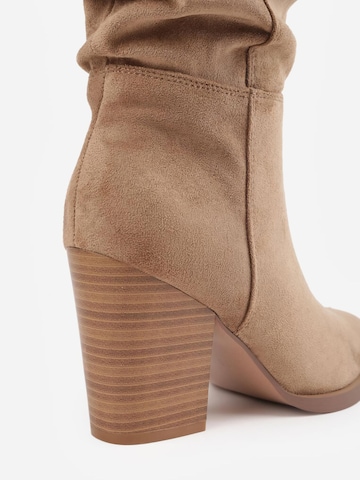 Boots 'Bottes bout pointu effet plissé à talon bloc - noir' VERA Collection en gris