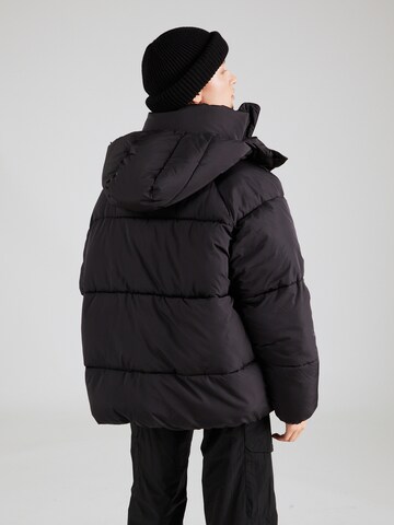 ELLESSE Winter Jacket in Black