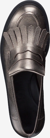 Slipper di Paul Green in bronzo