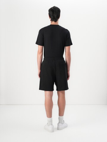 Calvin Klein Regular Trousers in Black