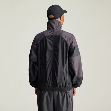 Giacca per l'allenamento di ADIDAS BY STELLA MCCARTNEY in grigio