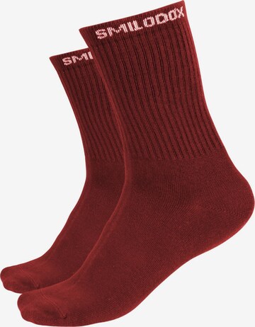 Chaussettes de sport Smilodox en rouge : devant