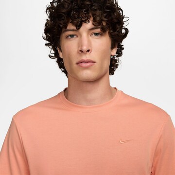 NIKE Funktionsshirt 'Primary' in Orange