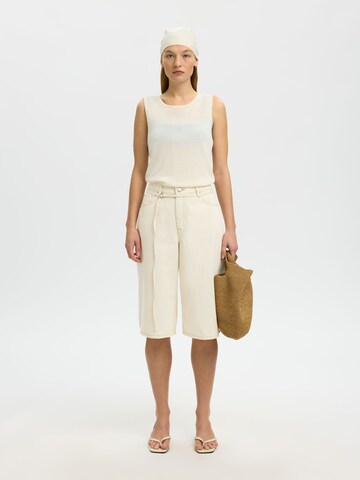 SELECTED - regular Vaquero en blanco