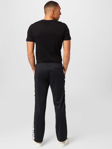 regular Pantaloni di GCDS in nero