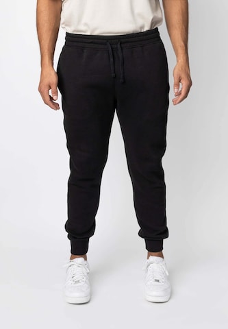 SNOCKS Tapered Pants in Black: front