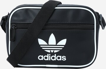 ADIDAS ORIGINALS Чанта за през рамо тип преметка в черно: отпред