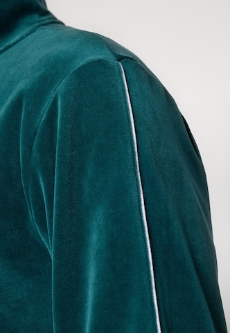 PUMA Sweatjacka 'Ess Elevated' i grön