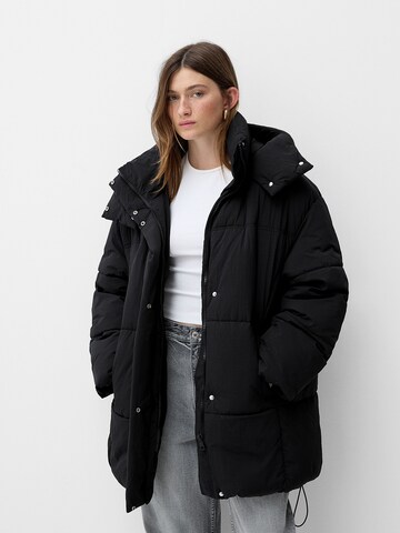 Bershka Winter jacket in Black: front