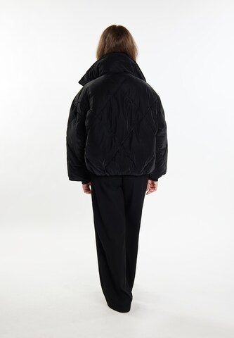 RISA Between-season jacket in Black