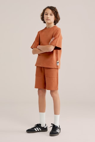 regular Pantaloni di WE Fashion in arancione