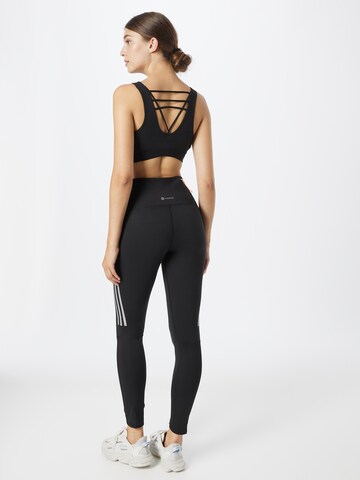 ADIDAS SPORTSWEAR Skinny Sporthose 'Own The Run Winter' in Schwarz