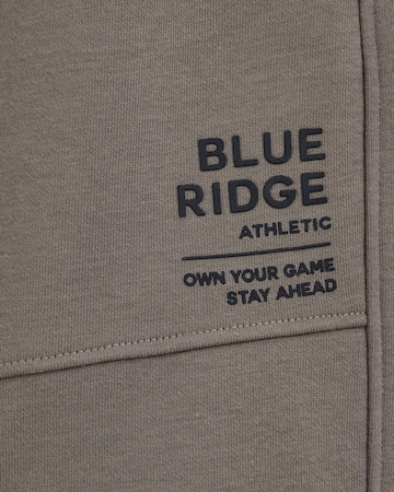 WE Fashion Regular Housut värissä harmaa