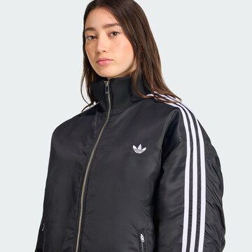 ADIDAS ORIGINALS Between-season jacket 'Firebird' in Black