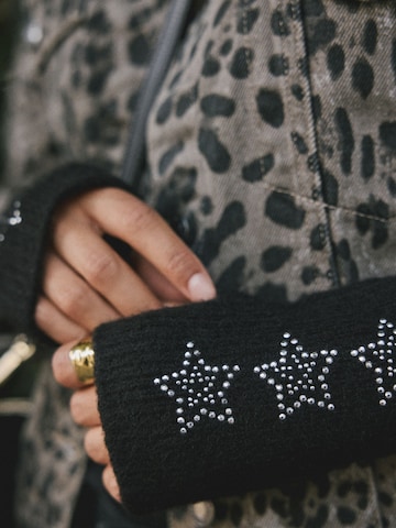 Scaldapolsi di Rockett St George in nero