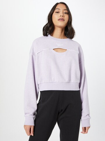 Sweat de sport Reebok en violet : devant