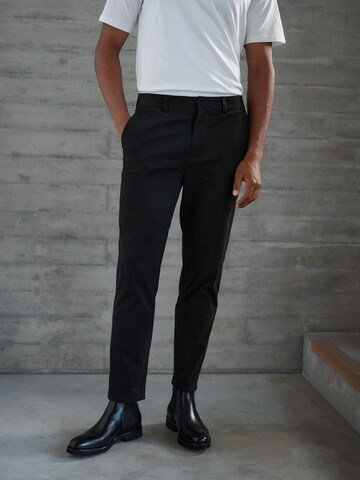 DAN FOX APPAREL Slim fit Chino Pants 'Essential' in Black: front
