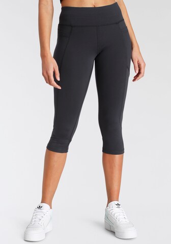 FAYN SPORTS Skinny Workout Pants in Black: front