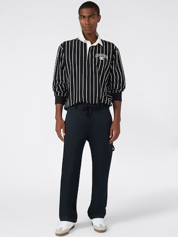 Champion Authentic Athletic Apparel Poloshirt in Schwarz
