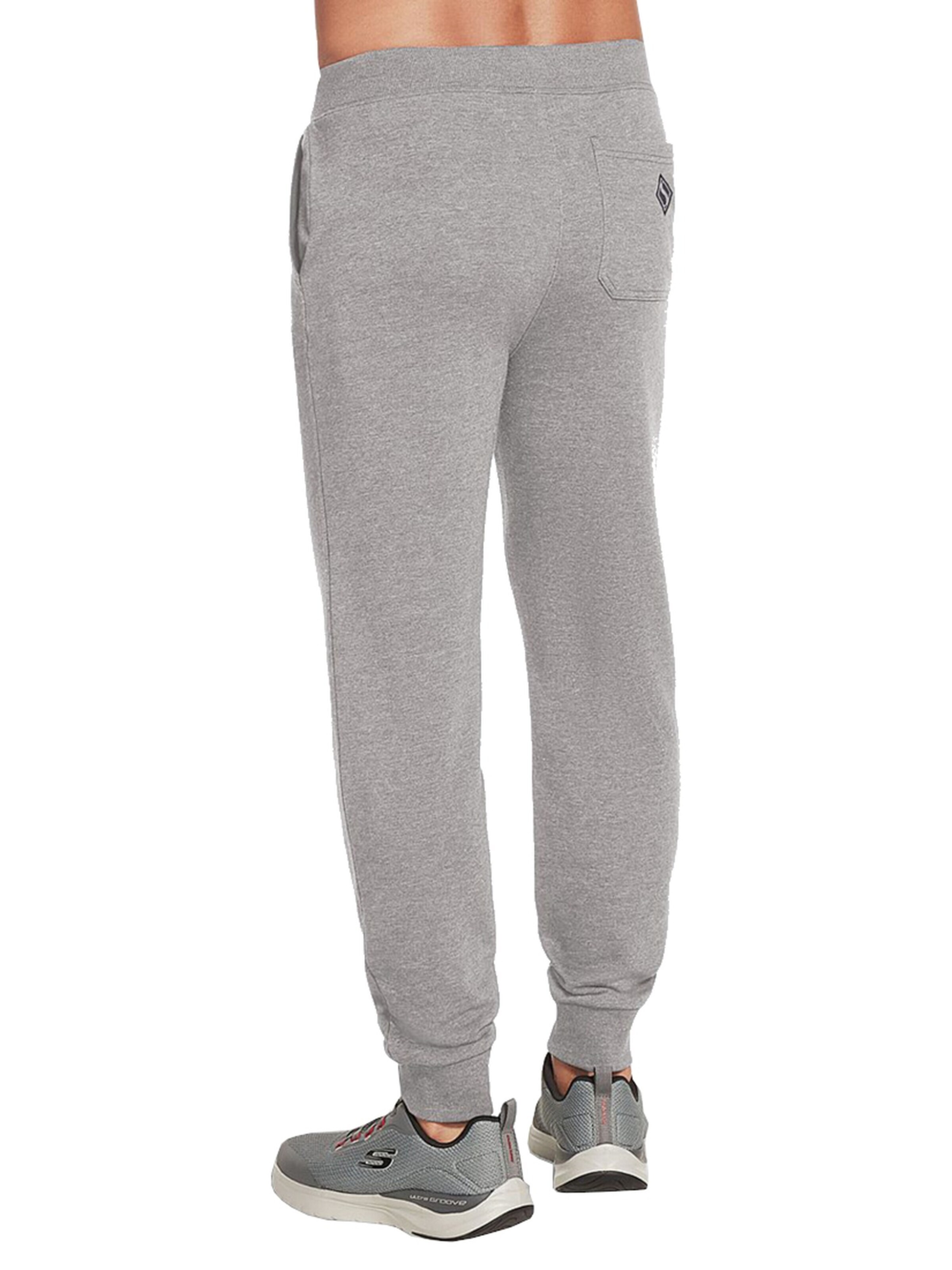 SKECHERS Tapered Sports trousers in Grey